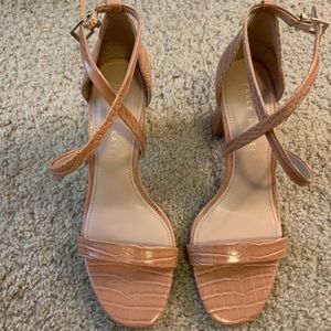 Heels. Snake skin print. Tag still in bottom. Brand new size 7.5